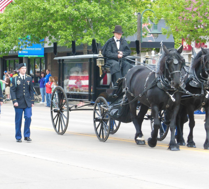 Dignified horse-drawn hearse carriage, designed to provide a traditional and respectful service for funeral processions