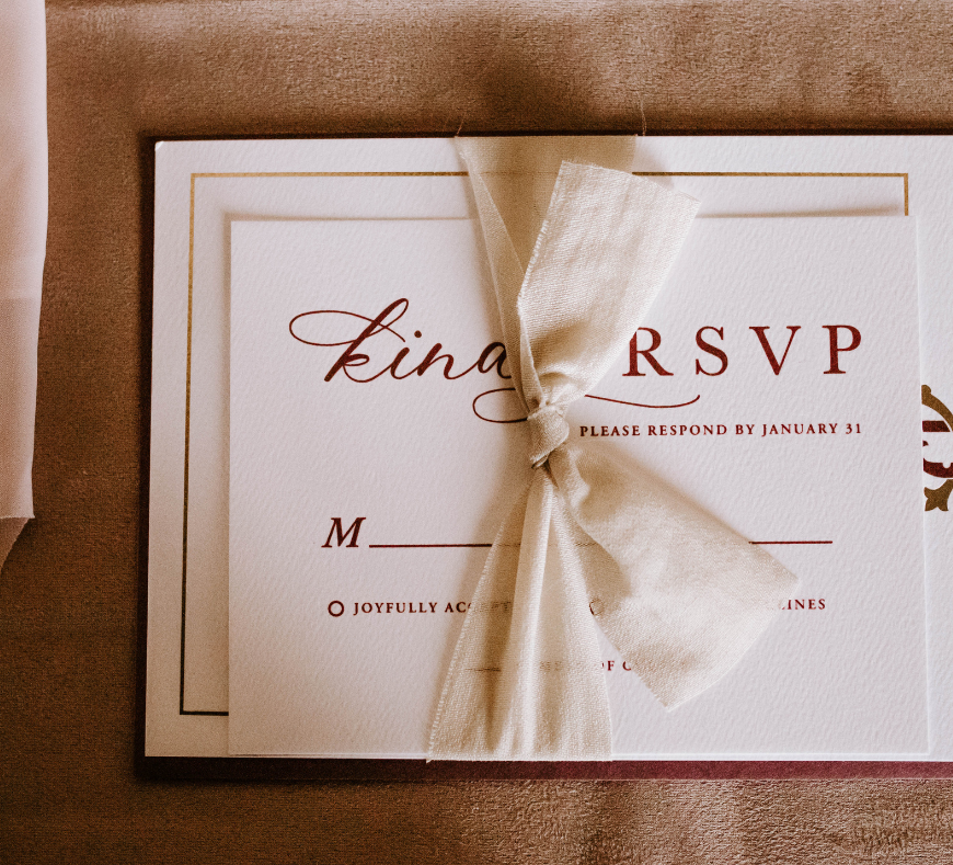 An elegant RSVP invitation, symbolizing the planning and personalization of special occasions, from weddings and corporate events to private celebrations, hosted by Cavanaugh Carriages.