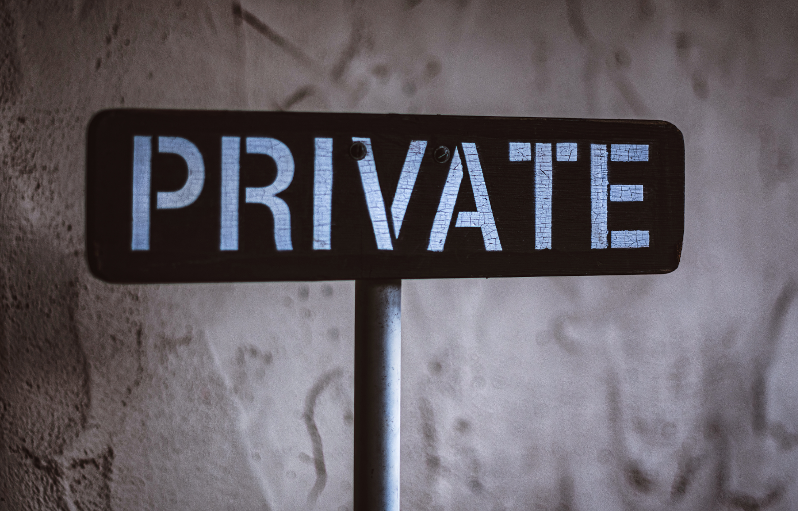A sign displaying 'Private,' symbolizing exclusive gatherings, private celebrations, and personalized event services offered by Cavanaugh Carriages.